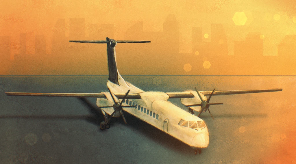 A white twin turboprop airliner standing on the ground at sunset, with a hazy city skyline behind it in orange light.