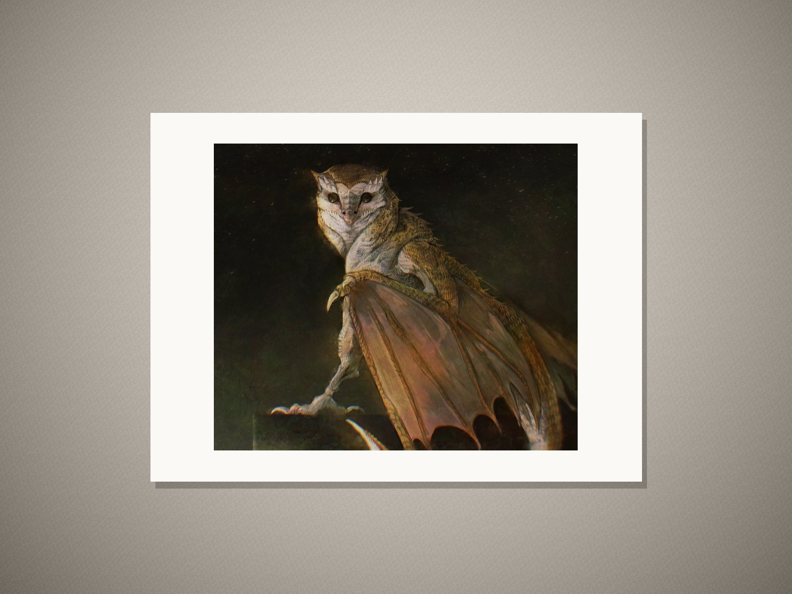 “Owlgon” art print in a white mat on a wall
